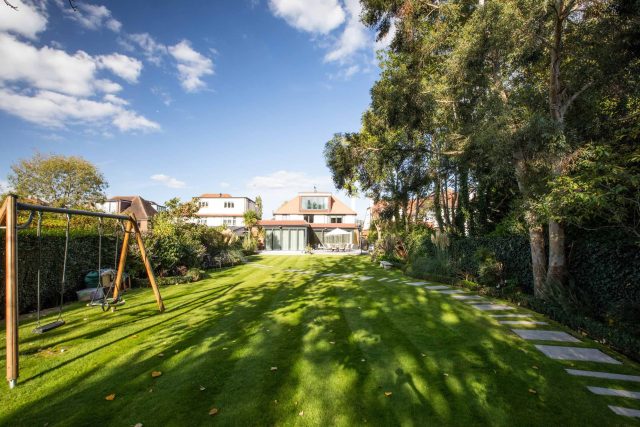 This lovely, large family garden in North London was designed by the garden landscaper, The Garden Builders. It offers free flowing curves and spiral shapes.