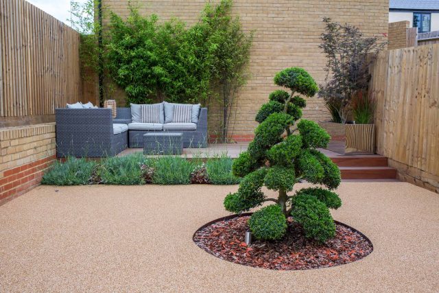 Japanese style garden, designed and constructed by The Garden Builders floor levels and planting geometry white porcelain tiles landscape company wood decking.