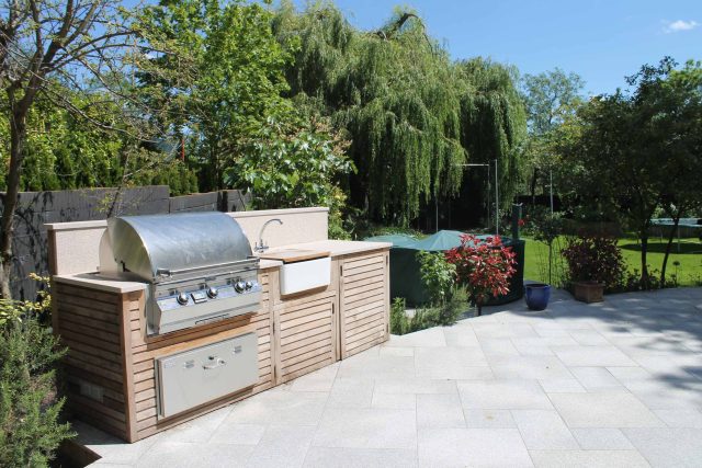 Blackheath Design, Hauf House, living green wall, dark granite edge detail, solid Oak automated gates a specialist garden contractors landscaping company.