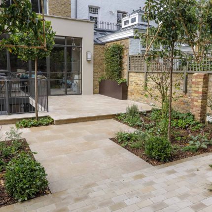 Elegant airy west London traditional contemporary garden by designer Camilla Hiley, urban with rustic country touches landscaping specialists in planting.