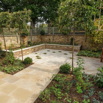 Elegant airy west London traditional contemporary garden by designer Camilla Hiley, urban with rustic country touches landscaping specialists in planting.