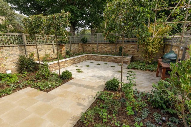Elegant airy west London traditional contemporary garden by designer Camilla Hiley, urban with rustic country touches landscaping specialists in planting.