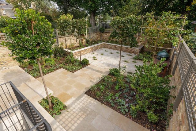 Elegant airy west London traditional contemporary garden by designer Camilla Hiley, urban with rustic country touches landscaping specialists in planting.