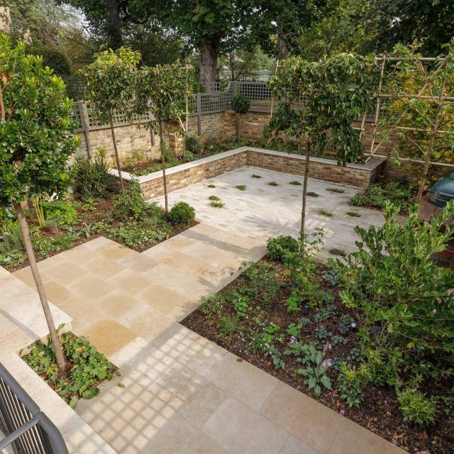 Elegant airy west London traditional contemporary garden by designer Camilla Hiley, urban with rustic country touches landscaping specialists in planting.