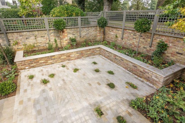 Elegant airy west London traditional contemporary garden by designer Camilla Hiley, urban with rustic country touches landscaping specialists in planting.