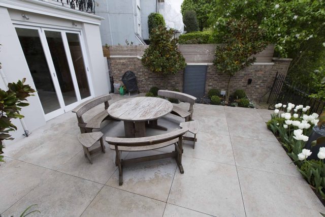 Contemporary yet elegant garden design in Notting Hill, with good entertaining space, slate water feature and sculpture, beautiful communal garden landscaper.