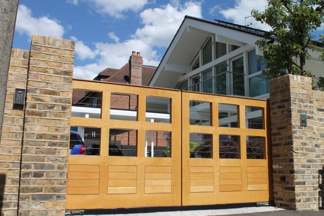 Blackheath Design, Hauf House, living green wall, dark granite edge detail, solid Oak automated gates a specialist garden contractors landscaping company.
