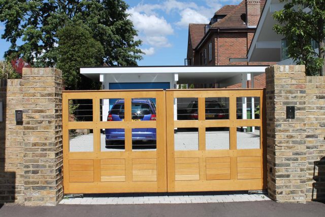 Blackheath Design, Hauf House, living green wall, dark granite edge detail, solid Oak automated gates a specialist garden contractors landscaping company.