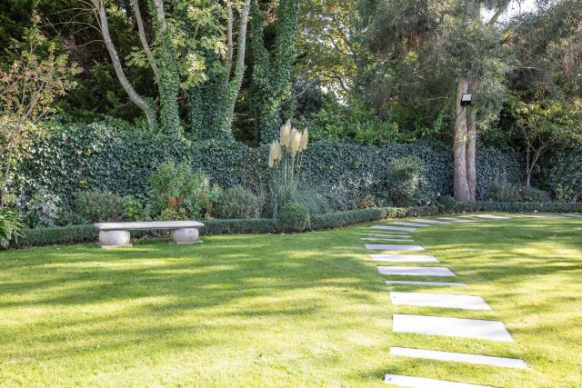 This lovely, large family garden in North London was designed by the garden landscaper, The Garden Builders. It offers free flowing curves and spiral shapes.