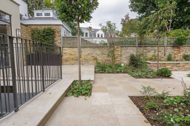 Elegant airy west London traditional contemporary garden by designer Camilla Hiley, urban with rustic country touches landscaping specialists in planting.