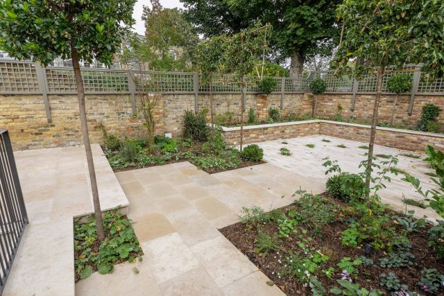 Elegant airy west London traditional contemporary garden by designer Camilla Hiley, urban with rustic country touches landscaping specialists in planting.