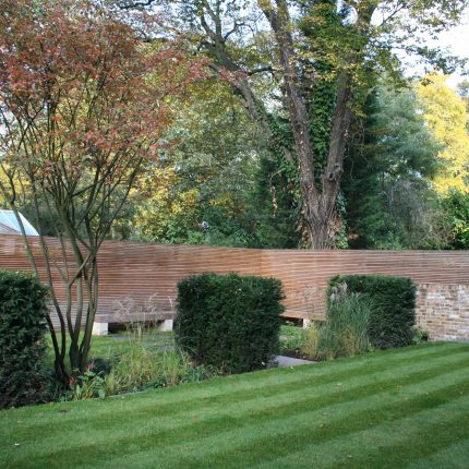 Gorgeous Garden Designs by Christopher Bradley Hole Maida Vale combination of decking and limestone paving, designers specialist contractors and landscapers.