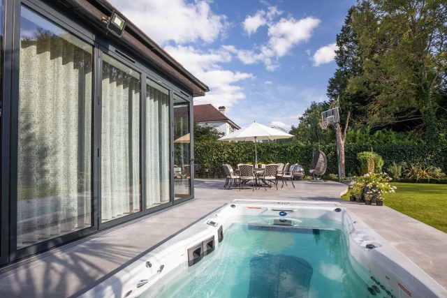 This lovely, large family garden in North London was designed by the garden landscaper, The Garden Builders. It offers free flowing curves and spiral shapes.