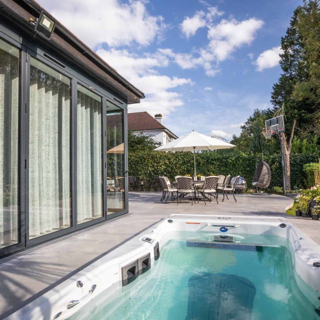 This lovely, large family garden in North London was designed by the garden landscaper, The Garden Builders. It offers free flowing curves and spiral shapes.