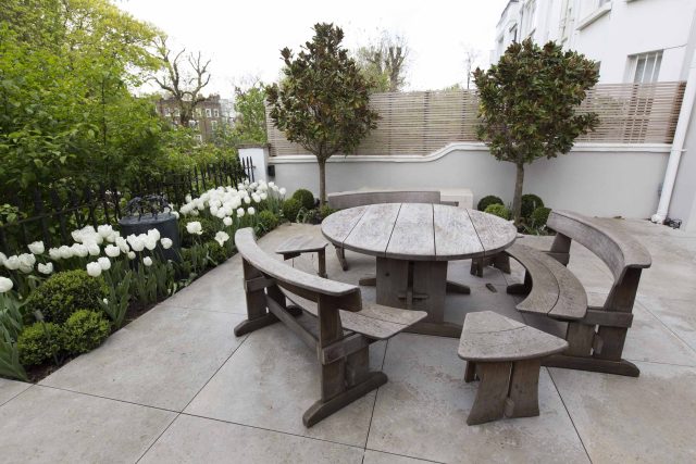 Contemporary yet elegant garden design in Notting Hill, with good entertaining space, slate water feature and sculpture, beautiful communal garden landscaper.