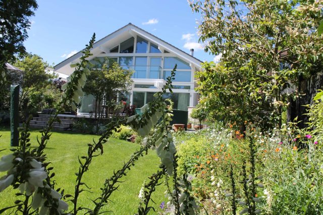 Blackheath Design, Hauf House, living green wall, dark granite edge detail, solid Oak automated gates a specialist garden contractors landscaping company.