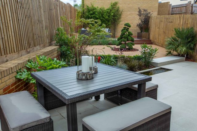 Japanese style garden, designed and constructed by The Garden Builders floor levels and planting geometry white porcelain tiles landscape company wood decking.