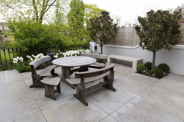 Contemporary yet elegant garden design in Notting Hill, with good entertaining space, slate water feature and sculpture, beautiful communal garden landscaper.