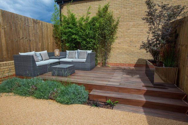 Japanese style garden, designed and constructed by The Garden Builders floor levels and planting geometry white porcelain tiles landscape company wood decking.
