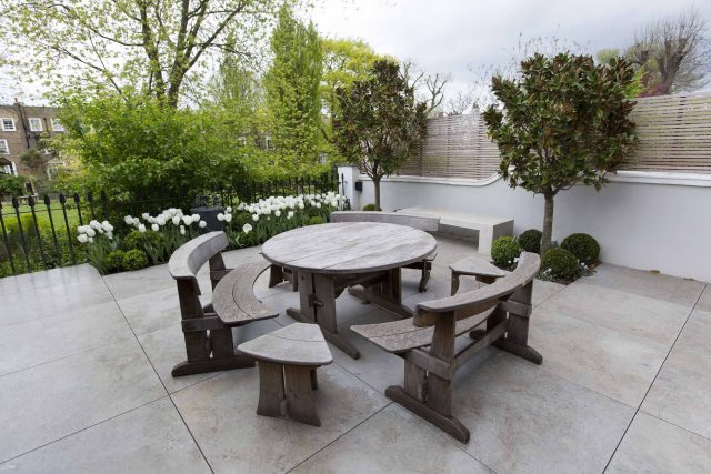Contemporary yet elegant garden design in Notting Hill, with good entertaining space, slate water feature and sculpture, beautiful communal garden landscaper.