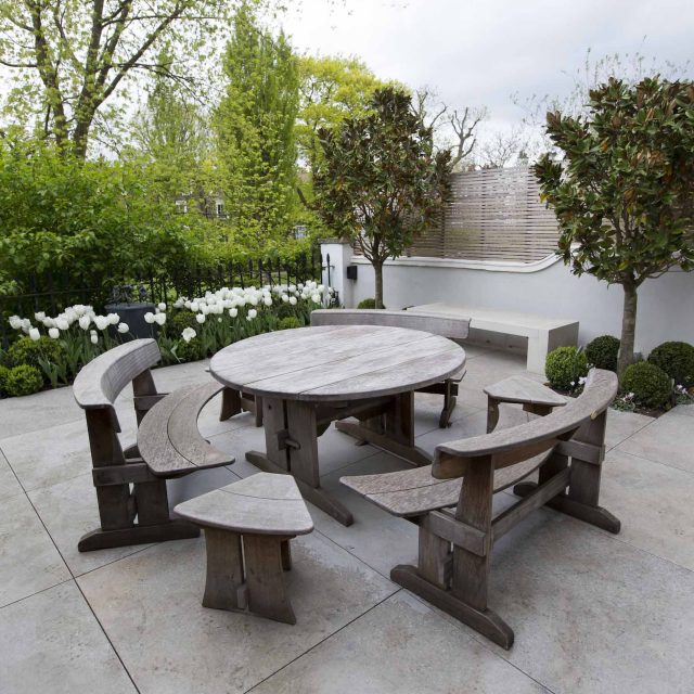 Contemporary yet elegant garden design in Notting Hill, with good entertaining space, slate water feature and sculpture, beautiful communal garden landscaper.
