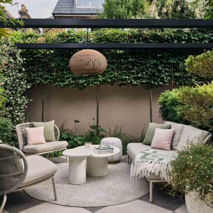 Walton On Thames garden designer outdoor kitchen dining metal pergola thoughtful planting