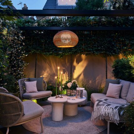 Walton On Thames garden designer outdoor kitchen dining metal pergola thoughtful planting