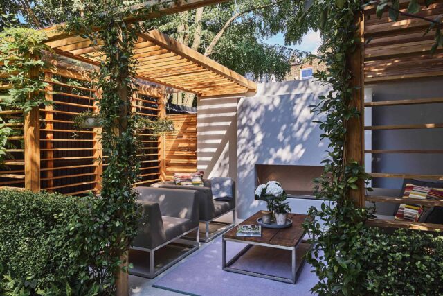 Tooting garden designer sophisticated outdoor retreat kitchen pergola, outdoor retreat for relaxation dining & year-round enjoyment.