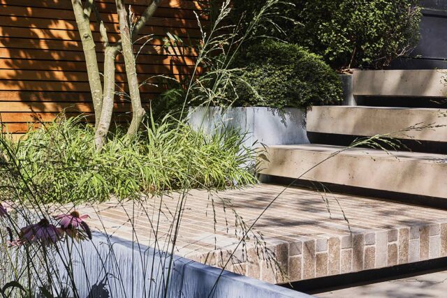 Tooting garden designer sophisticated outdoor retreat kitchen pergola, outdoor retreat for relaxation dining & year-round enjoyment.