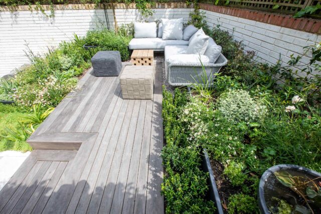 Roof garden courtyard designers building company London Islington planning roofers planting, sleek cubist-inspired, for effortless relaxation.