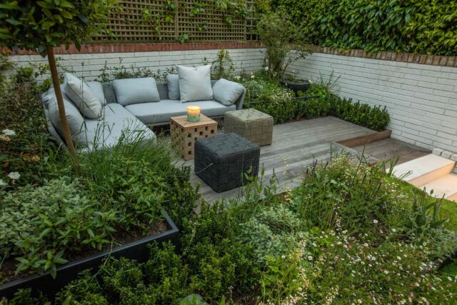 Roof garden courtyard designers building company London Islington planning roofers planting, sleek cubist-inspired, for effortless relaxation.