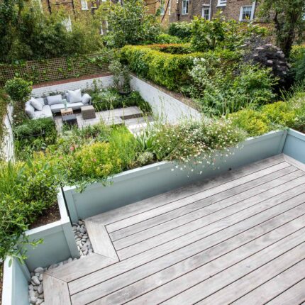Roof garden courtyard designers building company London Islington planning roofers planting, sleek cubist-inspired, for effortless relaxation.