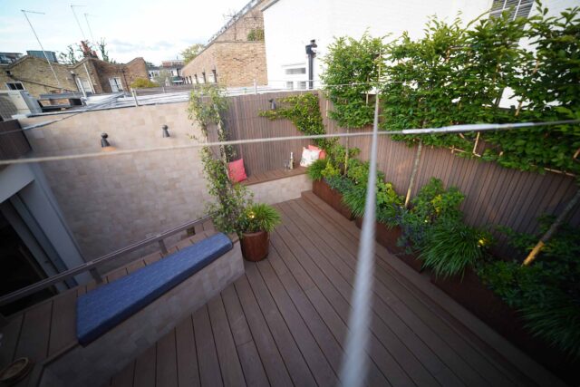 Roof garden terrace designers builders company London Notting Hill, created a cohesive transition between indoors and out.