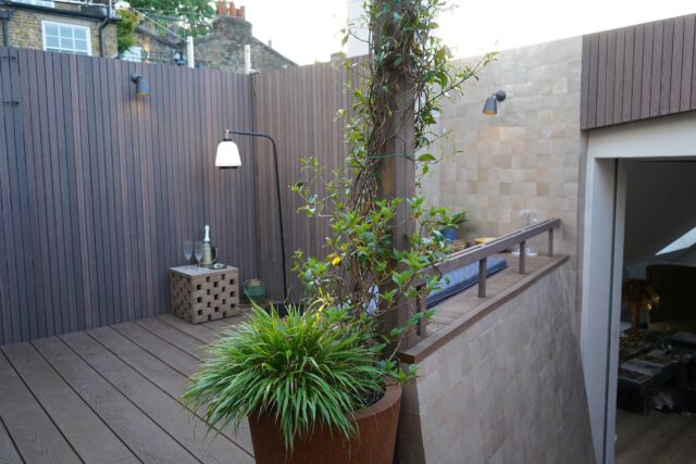 Roof garden terrace designers builders company London Notting Hill, created a cohesive transition between indoors and out.
