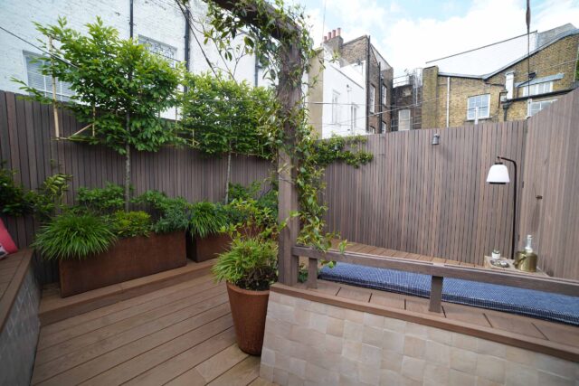 Roof garden terrace designers builders company London Notting Hill, created a cohesive transition between indoors and out.